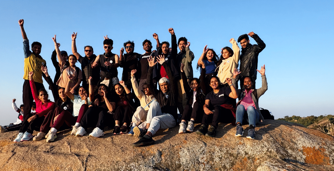 Uttari Betta trek near Bangalore with rocky trail, green hills, and panoramic views from the summit